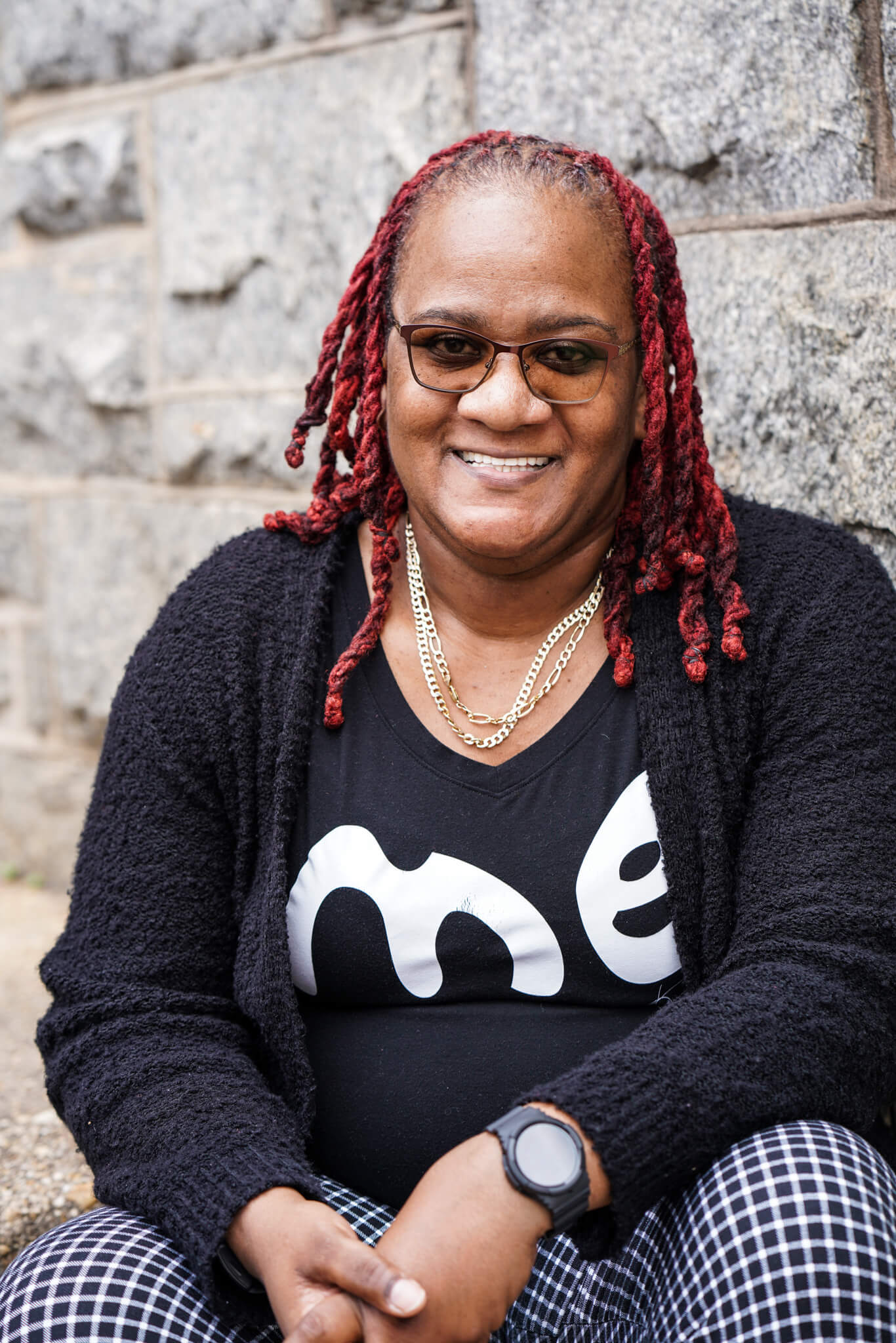 baltimore portrait photographer, Woman with red braids wearing shirt that says 
